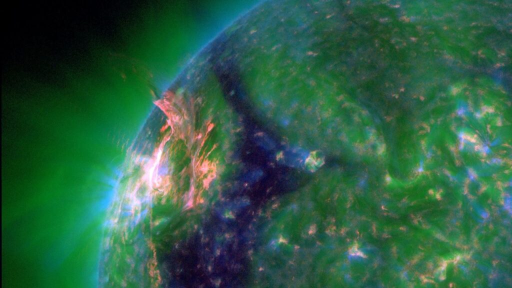 Eruption blows hole in sun’s atmosphere, unleashing solar flare and potentially triggering northern lights