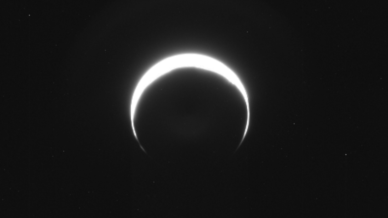 No, this isn’t a solar eclipse. It’s an image of Mars, captured by NASA’s asteroid-bound Psyche probe